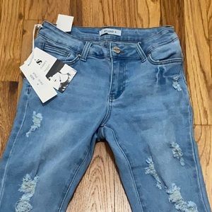 Ripped blue skinny jeans